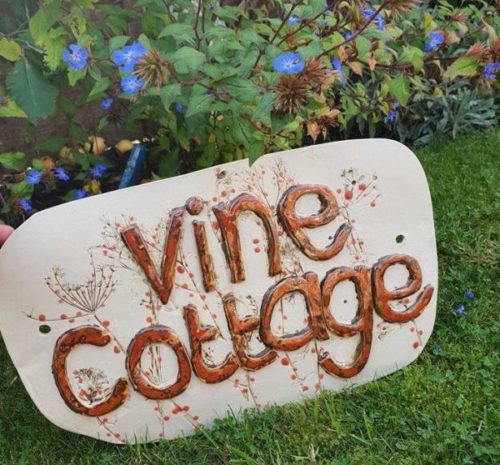 red berries personalised house sign
