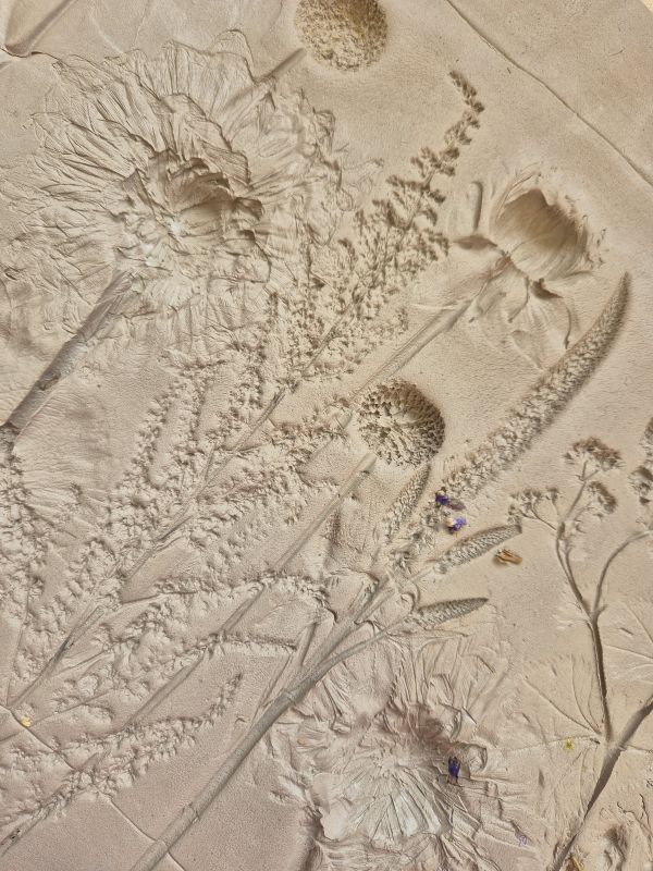 flower impression in clay